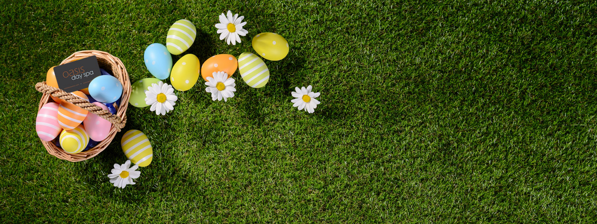 Easter basket and eggs in the grass